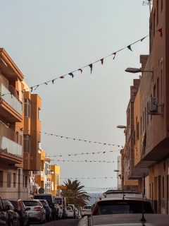 Colourful bunting above a quiet street