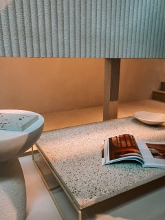 Open book on a wooden table in a cosy aesthetic setting for lifestyle blog post inviting readers to post your blog below in the comments (blogs to follow).
